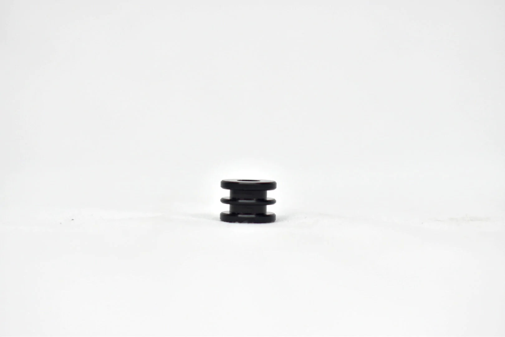ALUMINUM SPACER FOR M8 FUEL TANK - BLACK ANODIZED